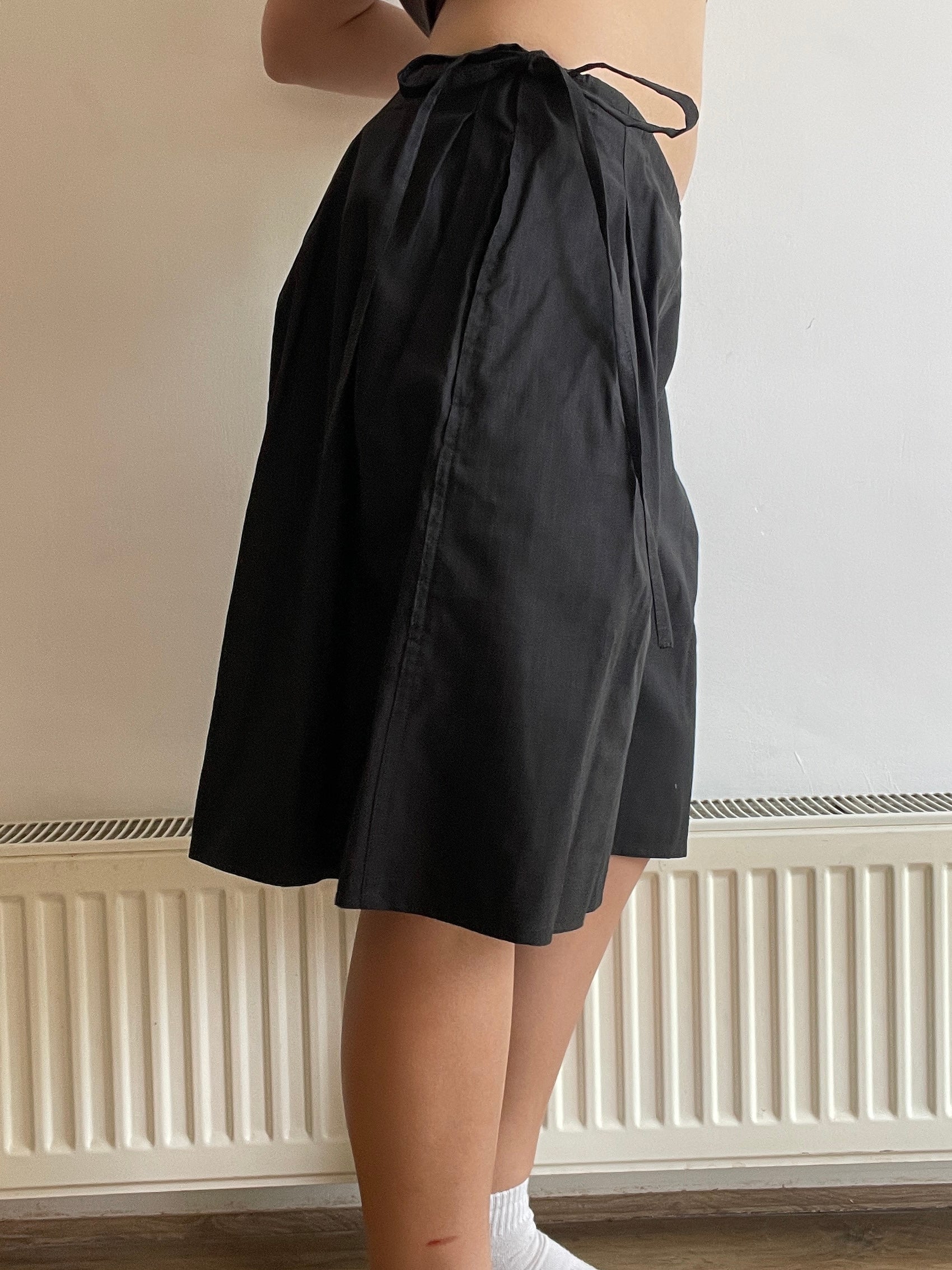 handmade pleated black pinstripe baggy shorts with pockets