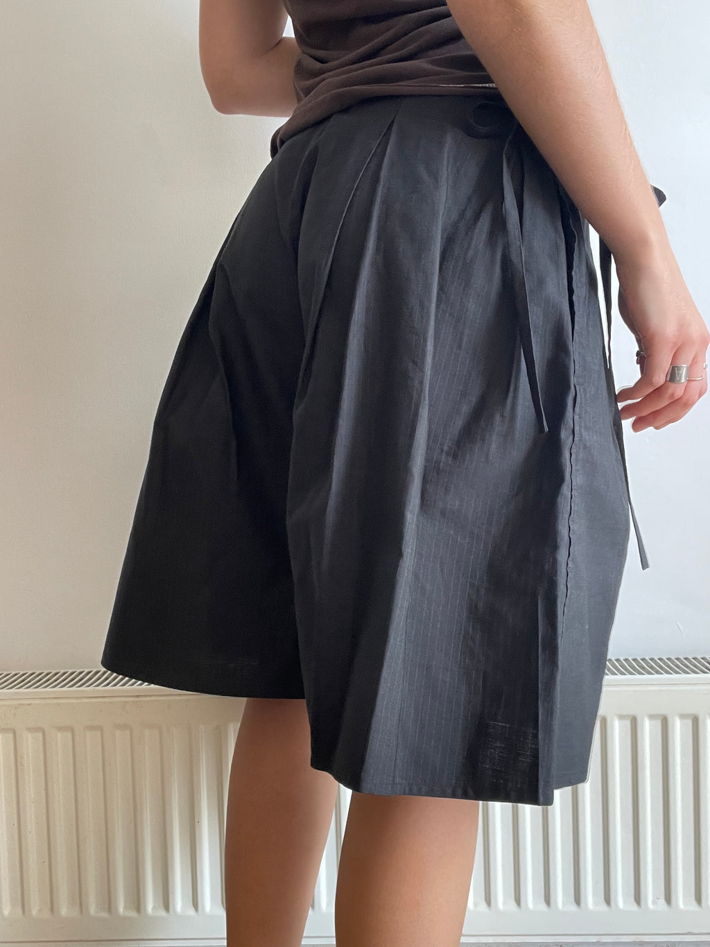 handmade pleated black pinstripe baggy shorts with pockets