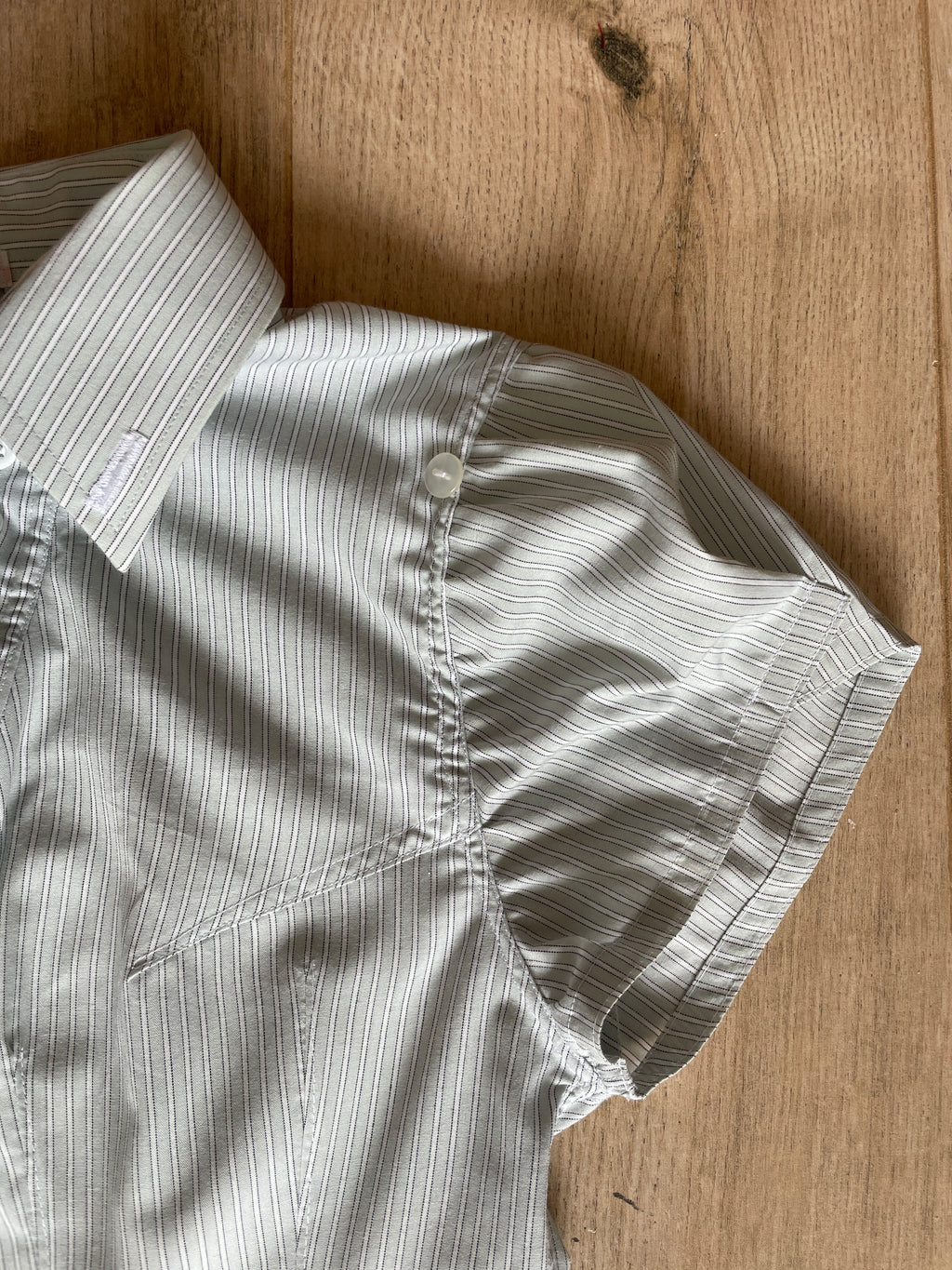 reworked asymmetrical wiggle button blouse