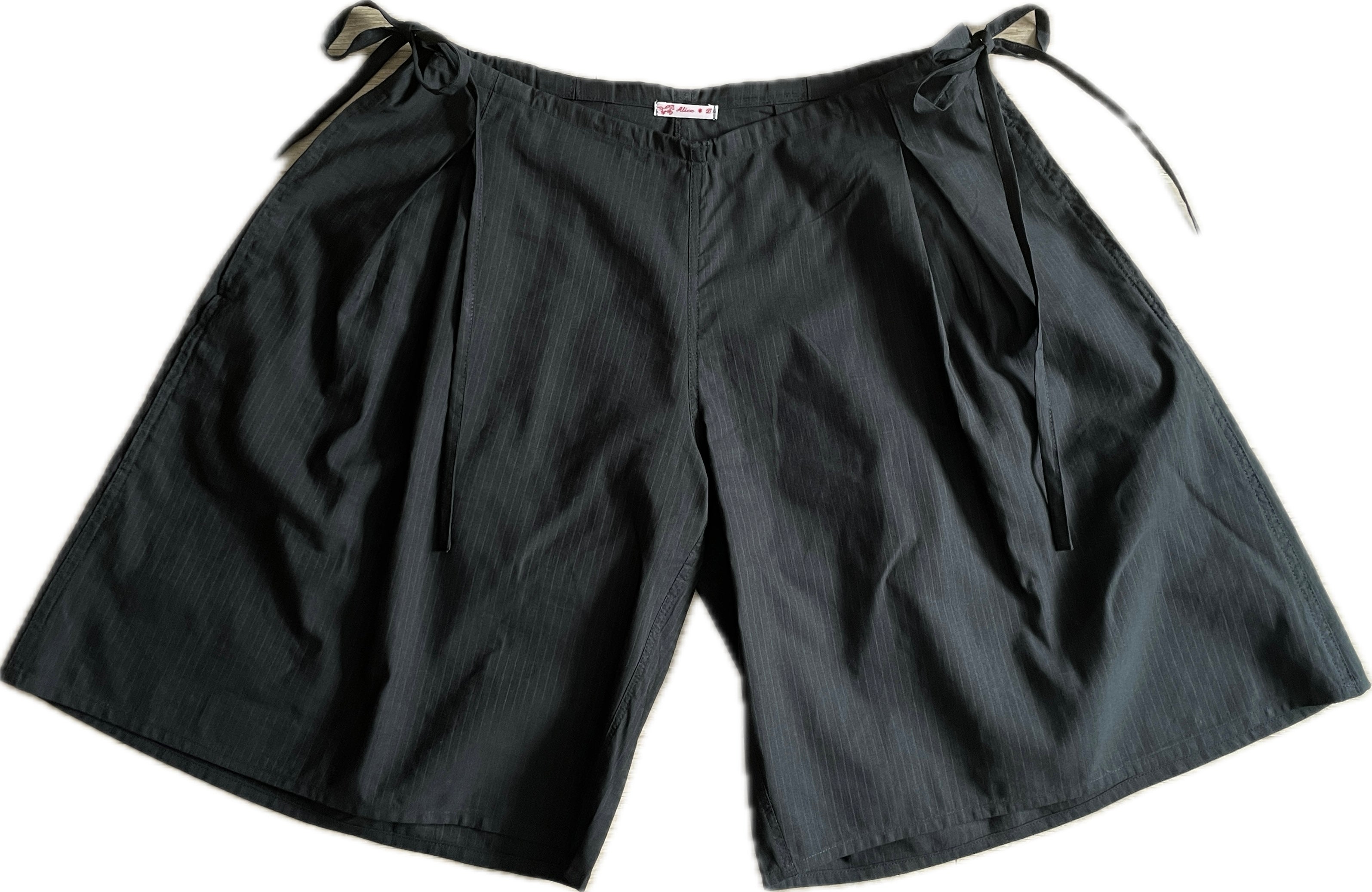 handmade pleated black pinstripe baggy shorts with pockets