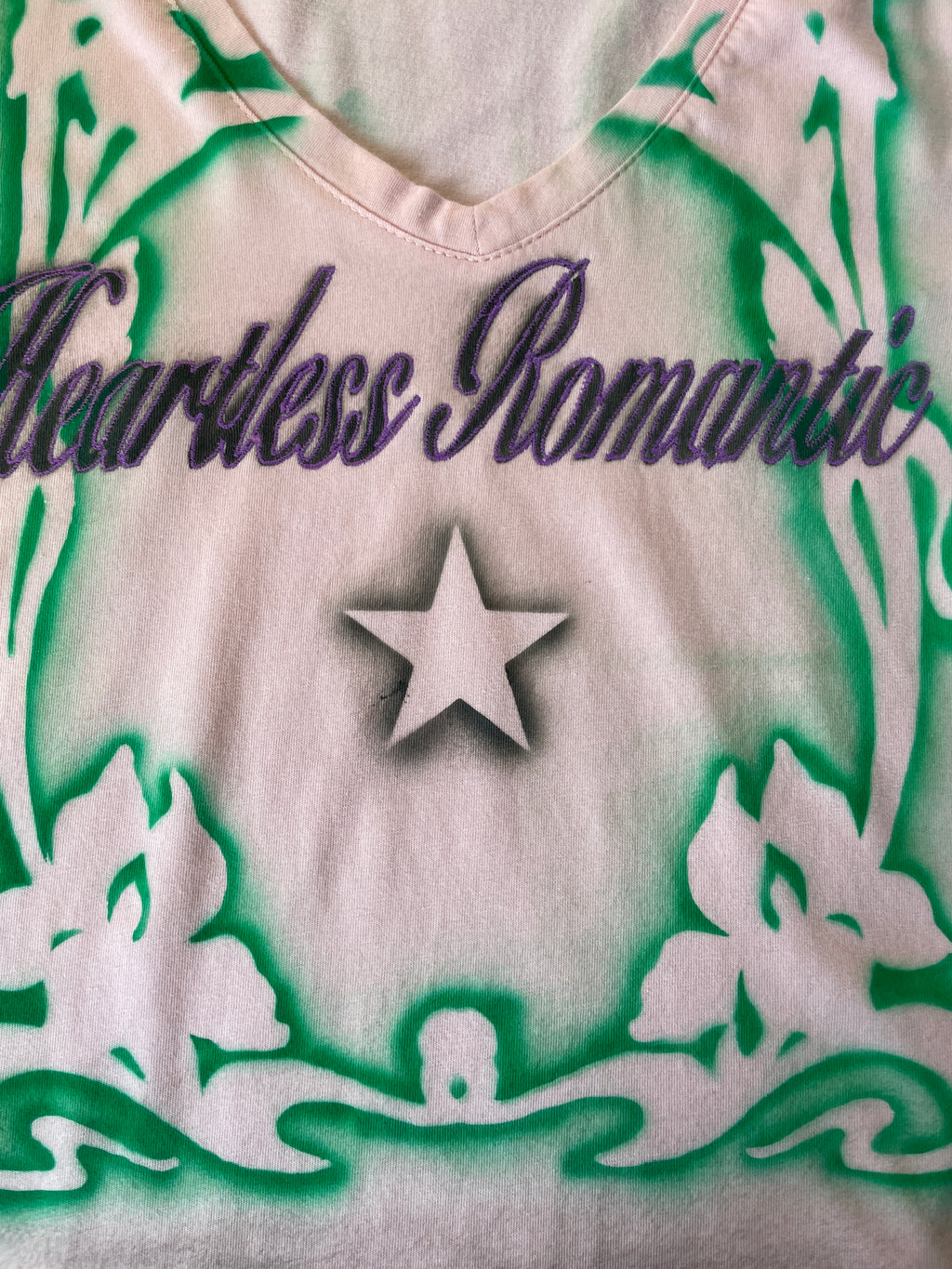 handmade airbrushed stencil print heartless romantic baby tee