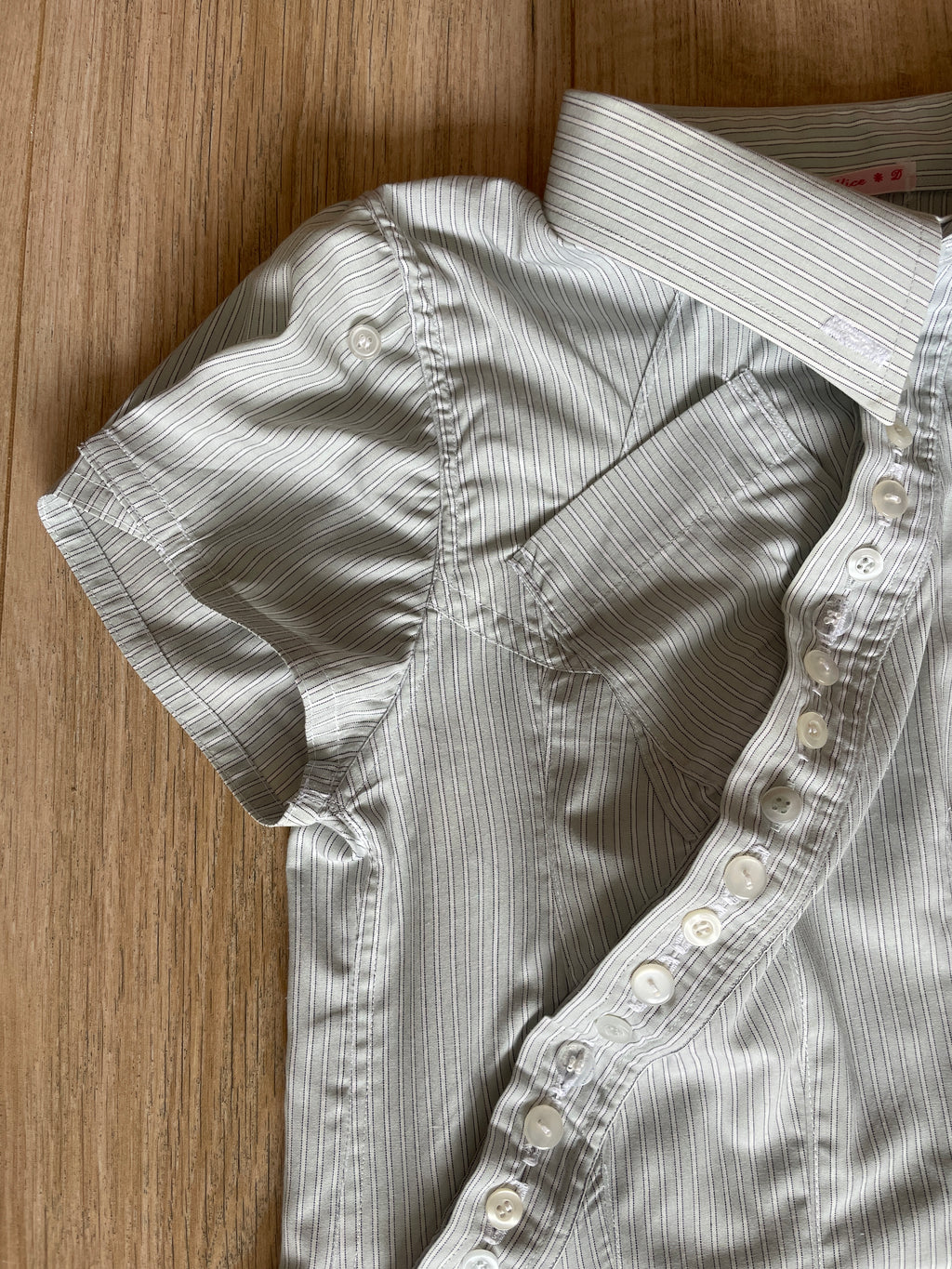 reworked asymmetrical wiggle button blouse