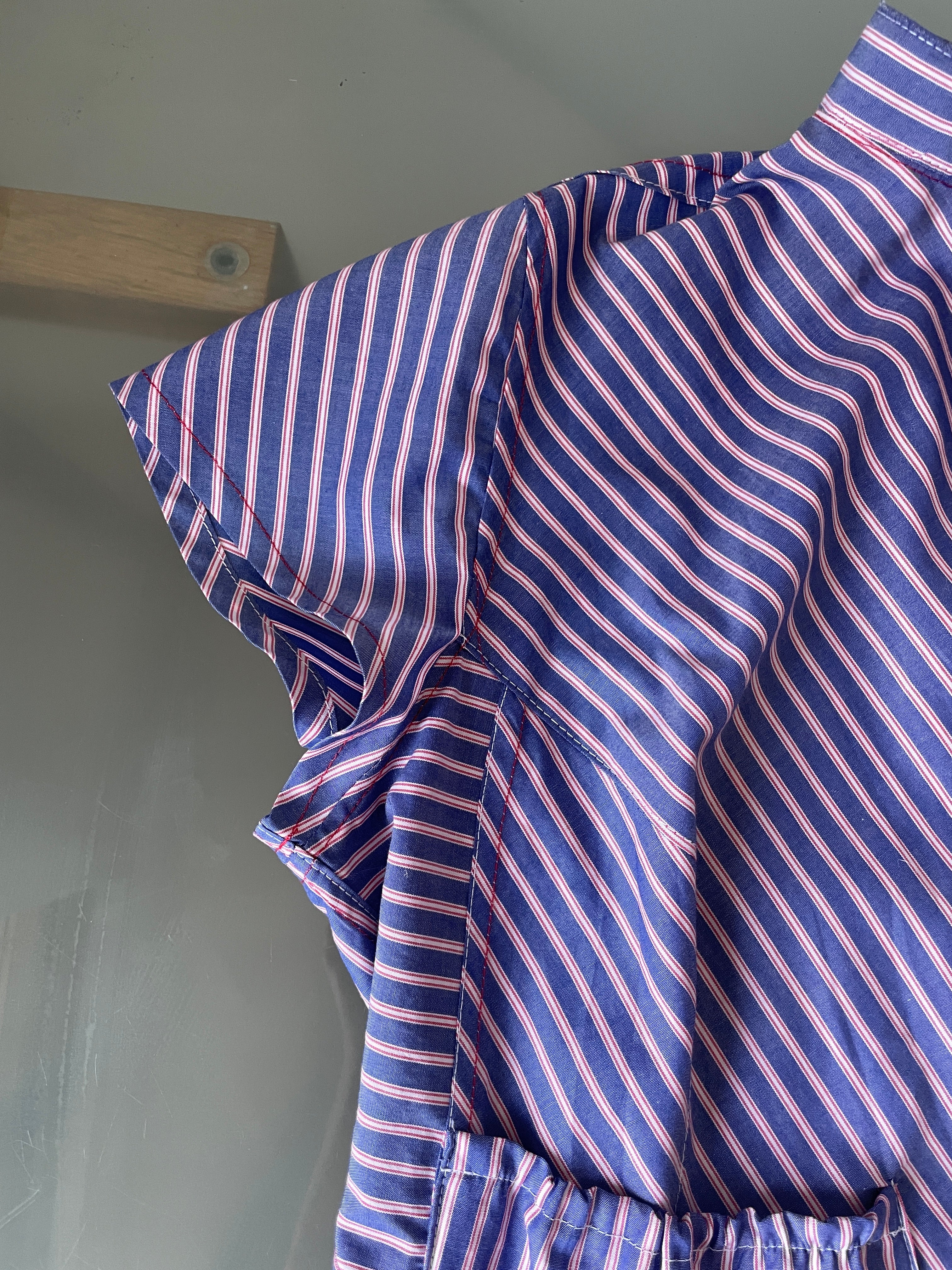 reworked striped pocket button up asymetrical shirt