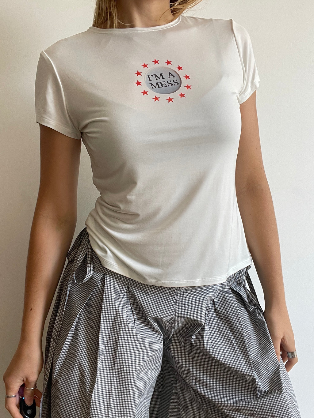 handmade slinky witty badge slogan mess baby tee