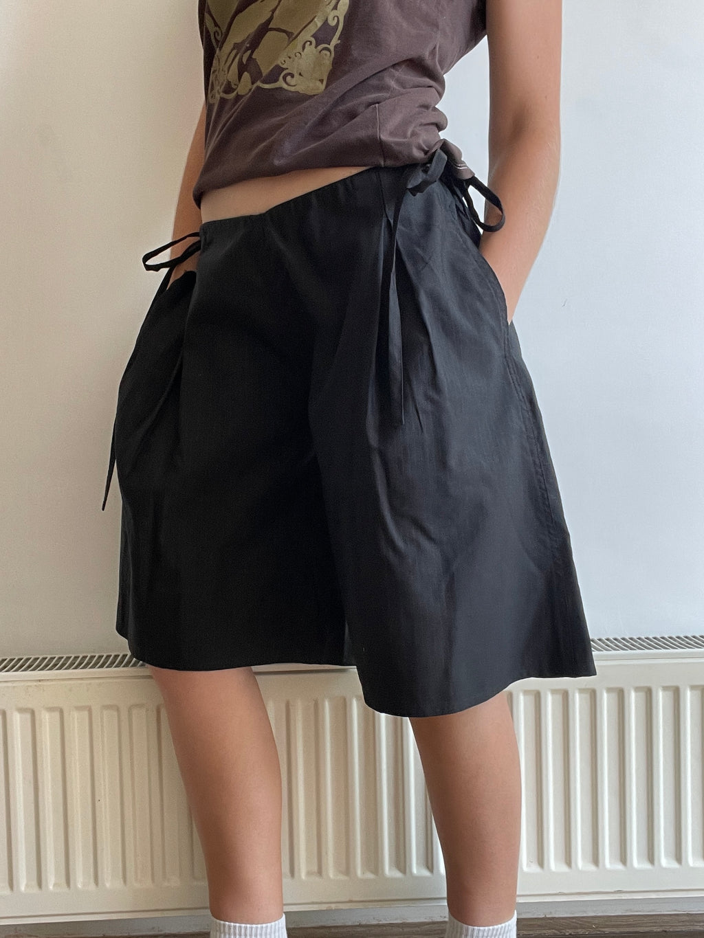 handmade pleated black pinstripe baggy shorts with pockets