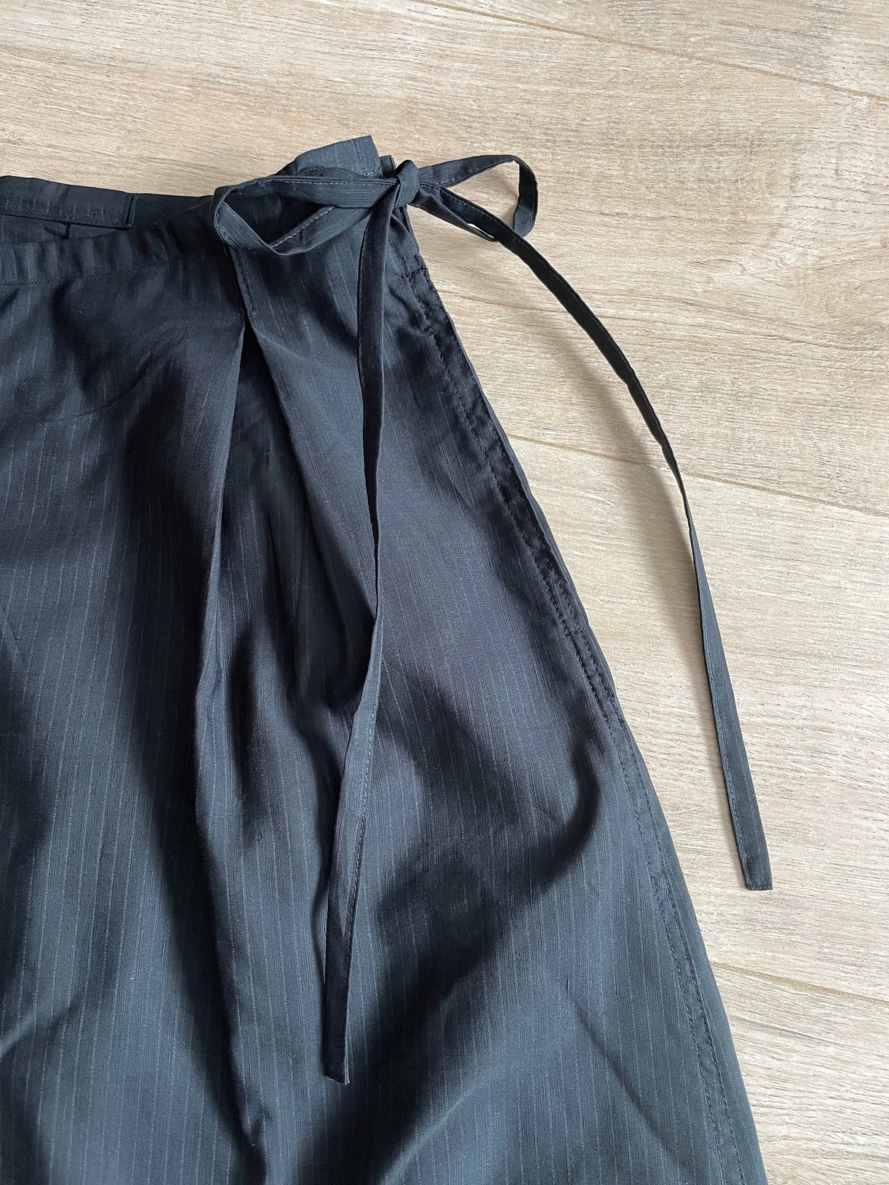 handmade pleated black pinstripe baggy shorts with pockets